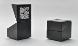 ring box with leather textured paper