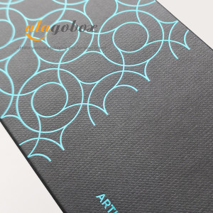black textured paper with blue foil